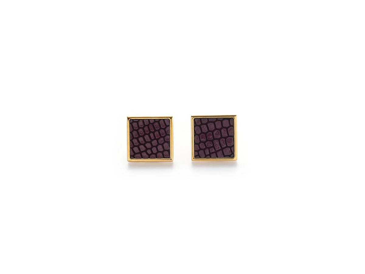 Close-up of Vesper Mini Earrings featuring Bordeaux lizard-embossed leather