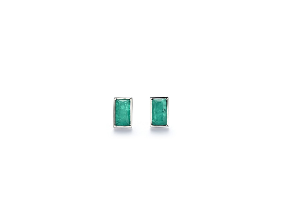 Close-up of Luciana green glass stone earrings with a silver-toned finish
